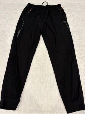 Baleaf Women’s Black Athletic Jogger Pants with Reflective Trim
Size M